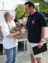 Brian Nero interviewing BFBS Assistant Ellie Trevitt and a Teddy Bear!